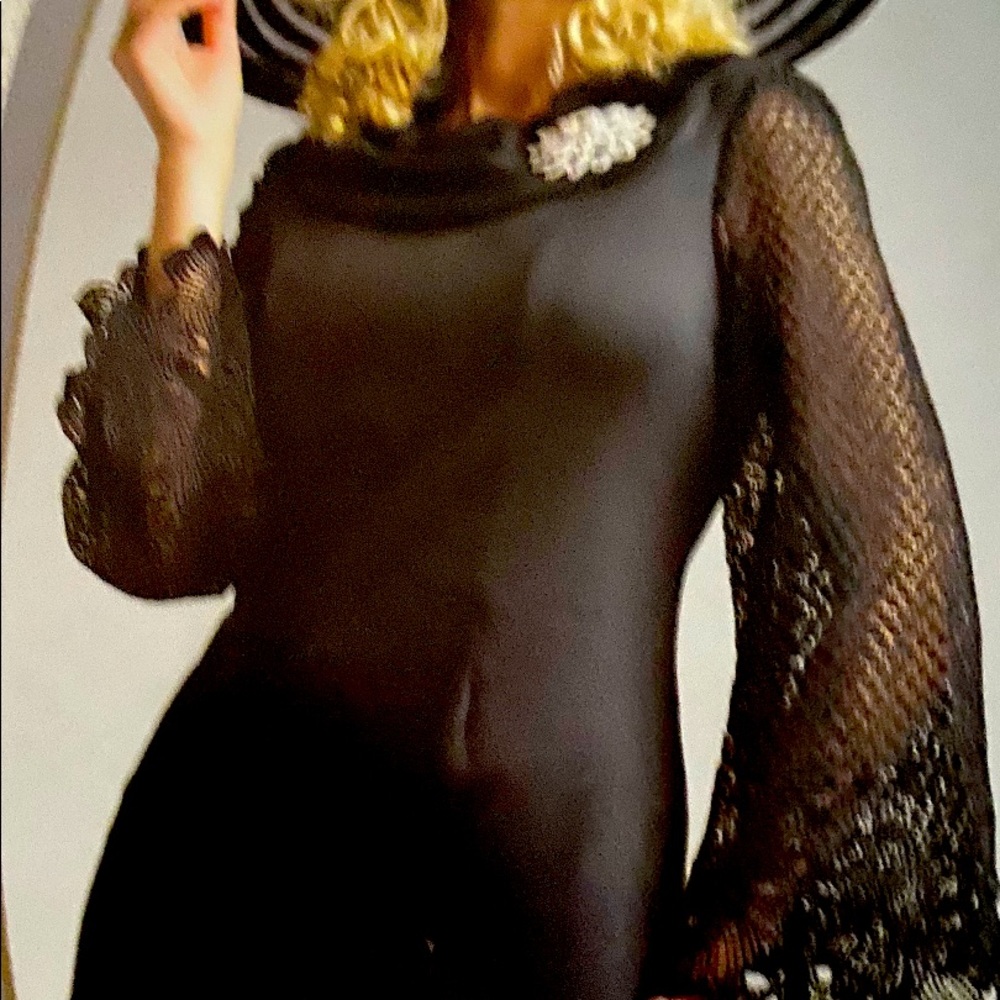 Beautiful black dress with gorgeous sleeves! 12, new with tags.